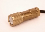 LED Flashlight / Torch (9 Bulbs, Long Lasting) Gold Colour