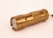 LED Flashlight / Torch (12 Bulbs, Long Lasting) Gold Colour